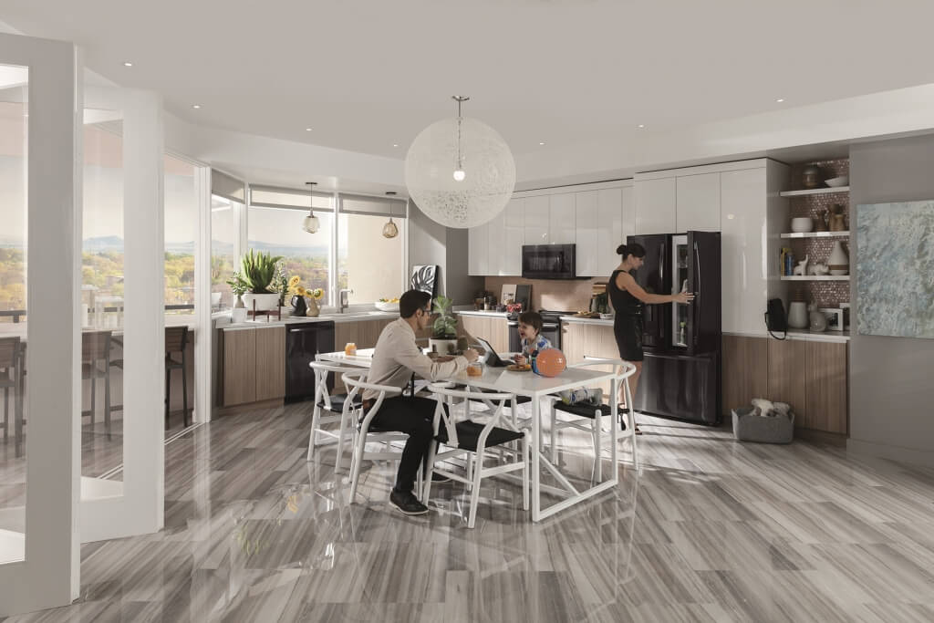 woman holding open GE refrigerator door