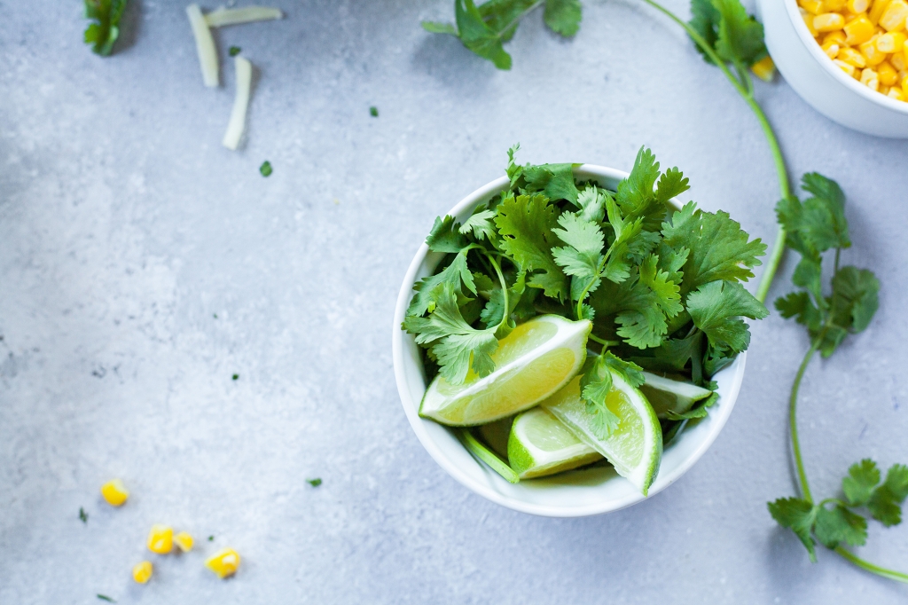 lime and cilantro in cup